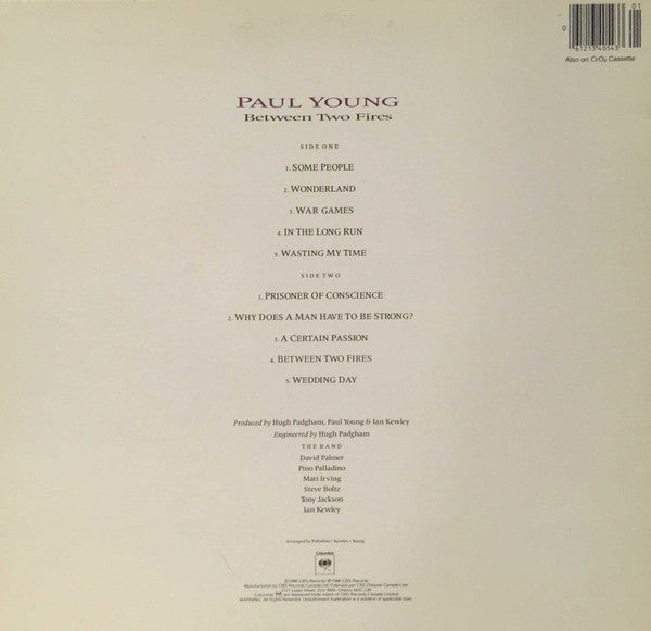 Paul Young - Between Two Fires (LP Tweedehands)