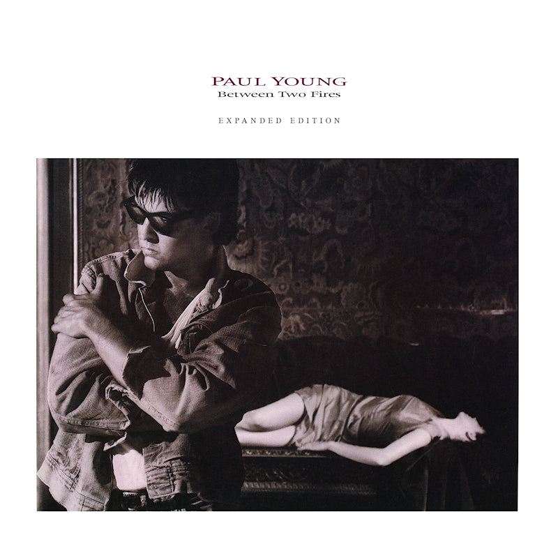 Paul Young - Between two fires (LP) - Discords.nl