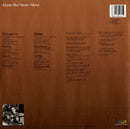 Larry Carlton - Alone/But Never Alone (LP Tweedehands)