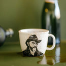 The hoarse-voiced cowboy; coffee is thicker than motöroil - Discords.nl