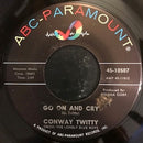 Conway Twitty : Go On And Cry / She Loves Me (She Don't Love You) (7")