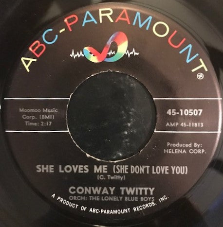 Conway Twitty : Go On And Cry / She Loves Me (She Don't Love You) (7")