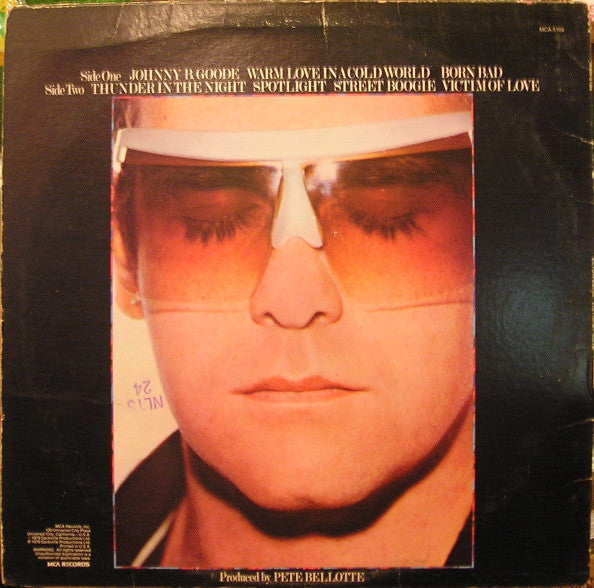 Elton John : Victim Of Love (LP, Album, Tan)