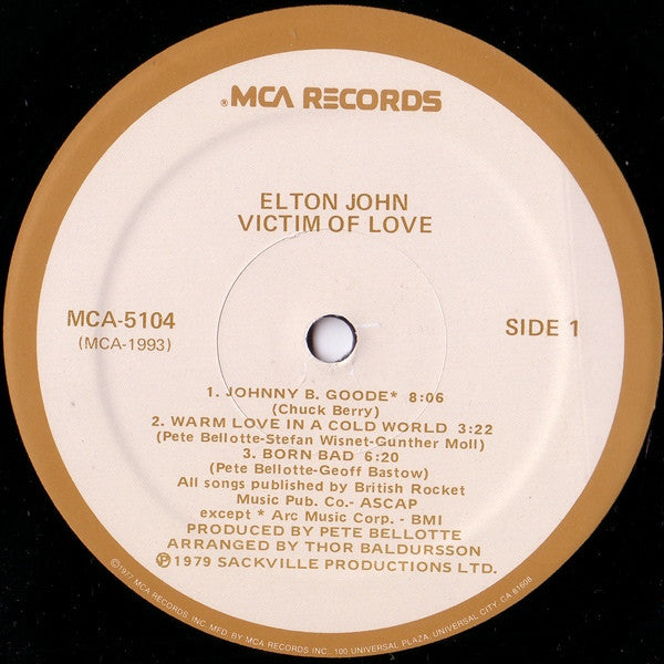 Elton John : Victim Of Love (LP, Album, Tan)